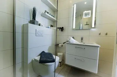 Ein Badezimmer in der Unterkunft Strandhochhaus SF09