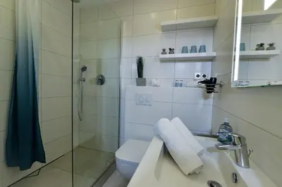 Ein Badezimmer in der Unterkunft Strandhochhaus SF09