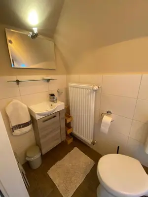 Ein Badezimmer in der Unterkunft Hus Heideblick -zwischen Natur und Nordsee-