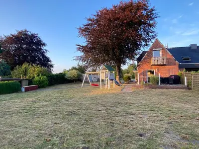 Ein Garten an der Unterkunft Hus Heideblick -zwischen Natur und Nordsee-