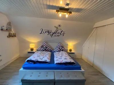 Ein Bett oder Betten in einem Zimmer der Unterkunft Hus Heideblick -zwischen Natur und Nordsee-