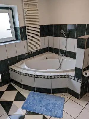 Ein Badezimmer in der Unterkunft Große Landhauswohnung