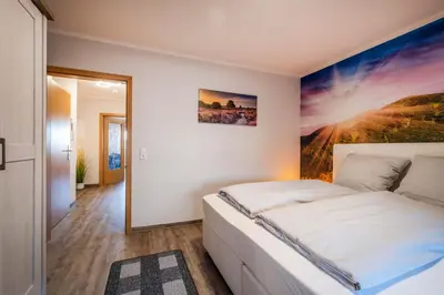 Ein Bett oder Betten in einem Zimmer der Unterkunft Haus Ankerplatz Apartment 1 3
