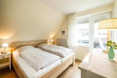 Ein Bett oder Betten in einem Zimmer der Unterkunft Apartment Zeppelinstraße