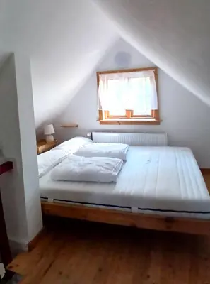 Ein Bett oder Betten in einem Zimmer der Unterkunft Ferienhaus Oppeln 21