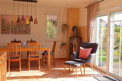 Ein Sitzbereich in der Unterkunft Ferienhaus Chalet Bel Air