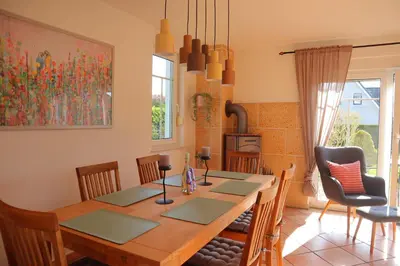 Ein Sitzbereich in der Unterkunft Ferienhaus Chalet Bel Air