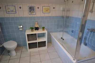 Ein Badezimmer in der Unterkunft Deichgraf Haushälfte