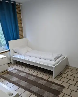 Ein Bett oder Betten in einem Zimmer der Unterkunft Monteurwohnung im Industriegebiet Brunsbüttel Süd