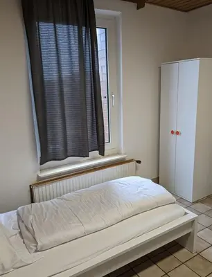 Ein Bett oder Betten in einem Zimmer der Unterkunft Monteurwohnung im Industriegebiet Brunsbüttel Süd