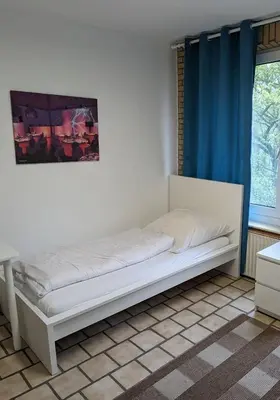 Ein Bett oder Betten in einem Zimmer der Unterkunft Monteurwohnung im Industriegebiet Brunsbüttel Süd
