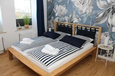 Ein Bett oder Betten in einem Zimmer der Unterkunft Ferienwohnung Familie Renner