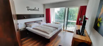 Ein Bett oder Betten in einem Zimmer der Unterkunft Haus Seehütte 303