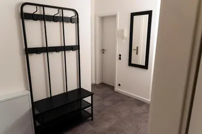 Ein Bett oder Betten in einem Zimmer der Unterkunft Strandnahe Ferienwohnung Nordsee Oase Whg 1