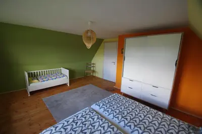 Ein Bett oder Betten in einem Zimmer der Unterkunft Ferienhaus Nordische Ruhe
