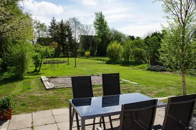 Ein Garten an der Unterkunft Ferienhaus Nordische Ruhe
