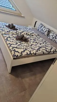 Ein Bett oder Betten in einem Zimmer der Unterkunft Strandnahe Ferienwohnung Nordsee Oase Whg. 1