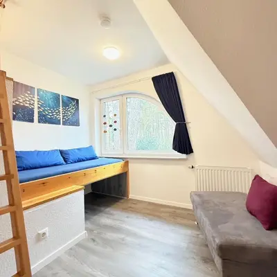 Ein Bett oder Betten in einem Zimmer der Unterkunft Voßhörn 22a