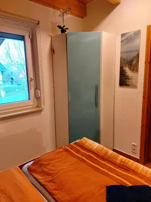Ein Bett oder Betten in einem Zimmer der Unterkunft Weitblick - b70565