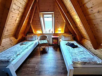 Ein Bett oder Betten in einem Zimmer der Unterkunft Weitblick - b70565