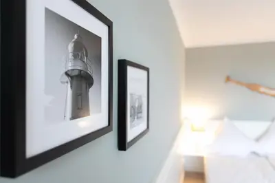 Ein Bett oder Betten in einem Zimmer der Unterkunft Top gelegenes Apartment mit Meerblick in der Ferne