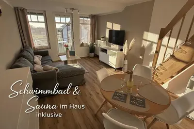 TV/Unterhaltungsangebot in der Unterkunft Dat Stürboord - Nordseeblick, Pool & Sauna