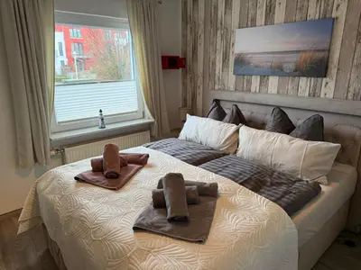Ein Bett oder Betten in einem Zimmer der Unterkunft Apartment Alleestraße