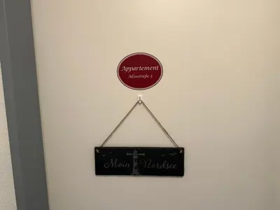Ein Zertifikat, Auszeichnung, Logo oder anderes Dokument, das in der Unterkunft Apartment Alleestraße ausgestellt ist