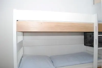 Ein Bett oder Betten in einem Zimmer der Unterkunft Hanseatic 502