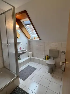 Ein Badezimmer in der Unterkunft Ferienhof am Meer