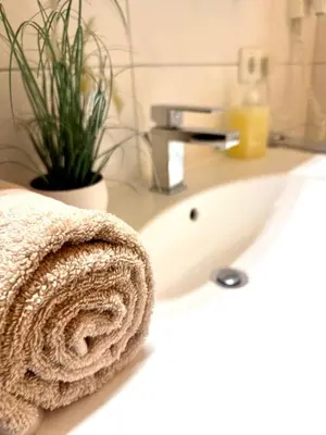 Ein Badezimmer in der Unterkunft Duhnerherz Bestlage im Zentrum,am Strand Duhnen, Balkon mit Meerblick,Wlan Parkplatz und Fahrradabstellraum Bettwäsche und Handtücher inkl