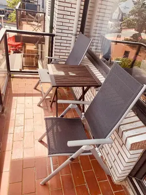 Ein Balkon oder eine Terrasse in der Unterkunft Duhnerherz Bestlage im Zentrum,am Strand Duhnen, Balkon mit Meerblick,Wlan Parkplatz und Fahrradabstellraum Bettwäsche und Handtücher inkl