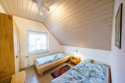Ein Bett oder Betten in einem Zimmer der Unterkunft Am Priel 20 DG