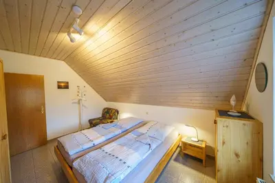 Ein Bett oder Betten in einem Zimmer der Unterkunft Am Priel 20 DG