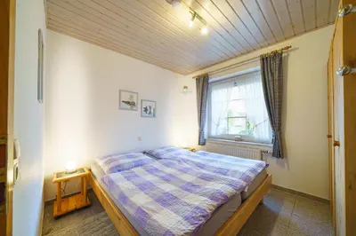 Ein Bett oder Betten in einem Zimmer der Unterkunft Am Priel 20 EG