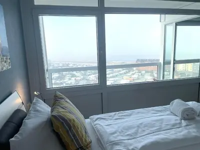 Ein Bett oder Betten in einem Zimmer der Unterkunft Frische Brise FeWo 12.06