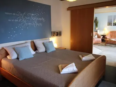 Ein Bett oder Betten in einem Zimmer der Unterkunft Residenz Trafalgar - Ferien-Apartments
