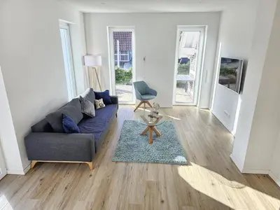 Ein Sitzbereich in der Unterkunft Ferienhaus im Angerdorf