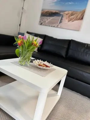 Ein Sitzbereich in der Unterkunft Residenz Cux-Havenglück