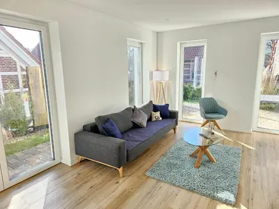 Ein Sitzbereich in der Unterkunft Ferienhaus Angerdorf Nr 21