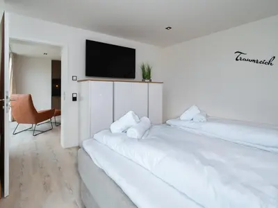 Ein Bett oder Betten in einem Zimmer der Unterkunft Inseltörn Wohnung 2