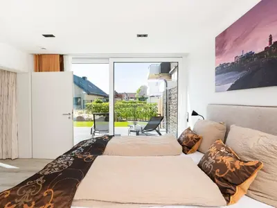 Ein Bett oder Betten in einem Zimmer der Unterkunft Inseltörn Wohnung 2