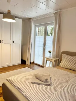 Ein Bett oder Betten in einem Zimmer der Unterkunft Ferienhaus Sandstrand