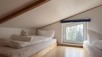 Ein Bett oder Betten in einem Zimmer der Unterkunft Kamps Schillingshof 3