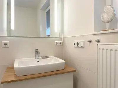 Ein Badezimmer in der Unterkunft Seaside 53° FeWo 5
