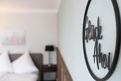 Ein Bett oder Betten in einem Zimmer der Unterkunft Top gelegene FeWo Strandkoje an der Perlebucht