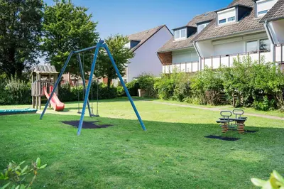 Ein Kinderspielbereich in der Unterkunft Duhner Ausblick mit Balkon