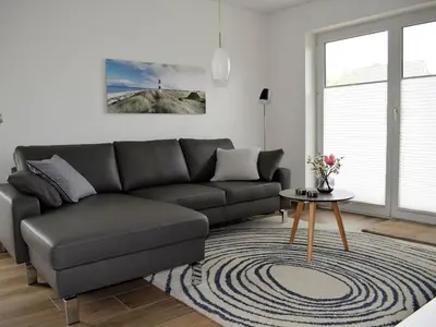 Ein Sitzbereich in der Unterkunft Holiday cottage on the dike Comfortable holiday residence