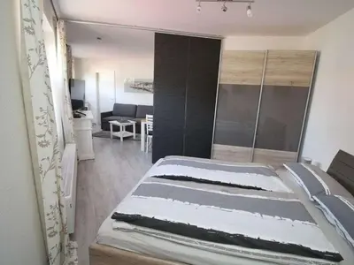 Ein Bett oder Betten in einem Zimmer der Unterkunft ToNi