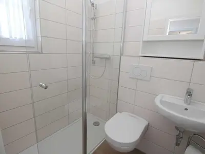 Ein Badezimmer in der Unterkunft ToNi